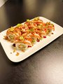 Flambeed soft shell salmon ebi roll
