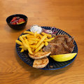 Steak van varkensnek schotel