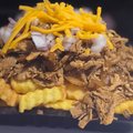 Loaded fries met kaas en pulled chicken