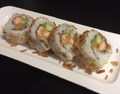 m98. Gefrituurde zalm uramaki