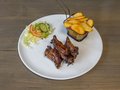 111. Spareribs schotel