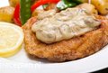 Schnitzel met champignonroomsaus