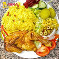 Schotel Rijst met halfkip وجبة رز مع نصف فروج