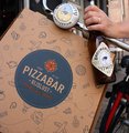 Pizza + een IJ-biertje = GRATIS FIETSBEL
